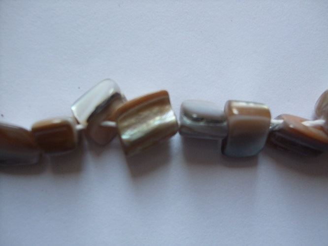 Natural Shell Beads - 15" strand which gives you approximately 45 Beads